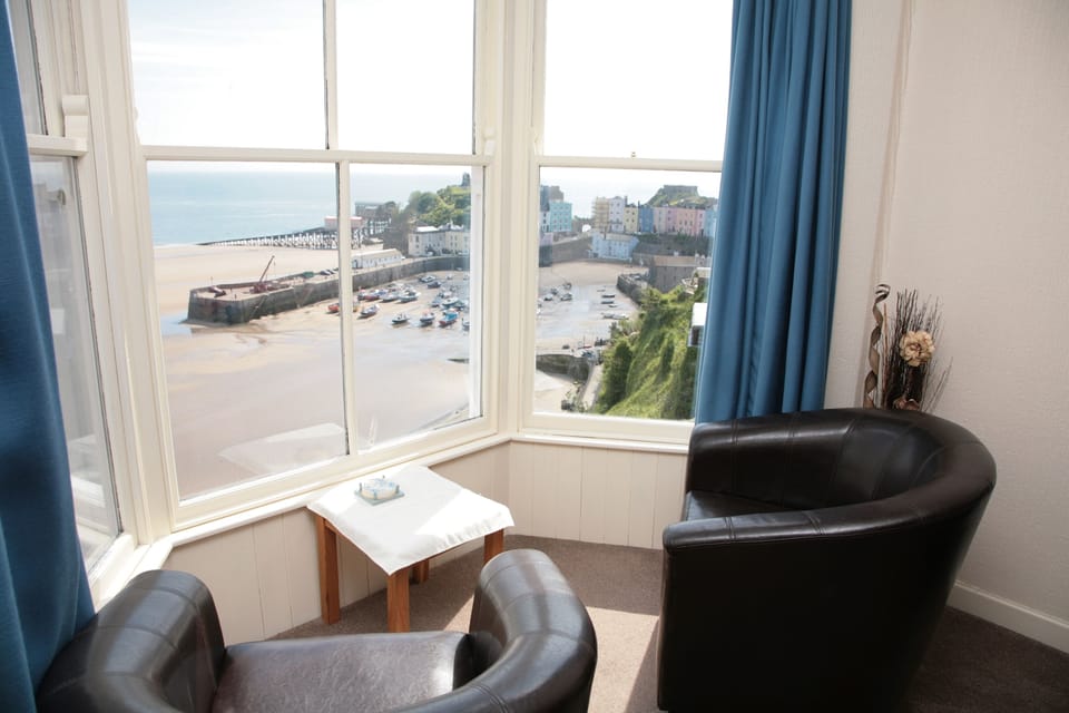 Lounge window overlooking Beach and Harbour