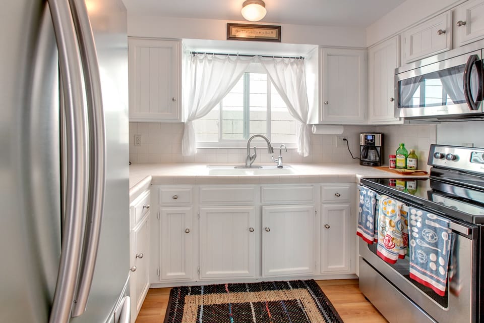 kitchen sink and electric stove 