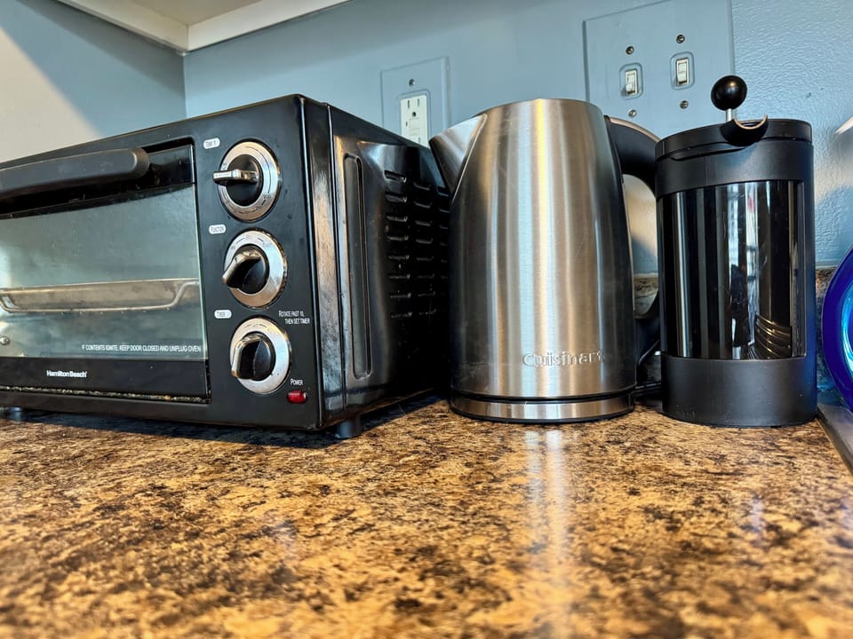 Hot water kettle, French press, tea, and local organic coffee (drip coffee maker also available)
