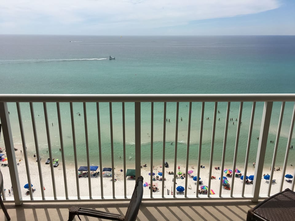Private covered balcony with endless view of the white beach sand & of theGulf