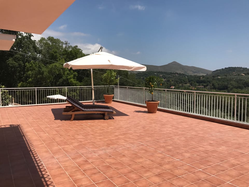 Main terrace with panoramic views and sea in the distance