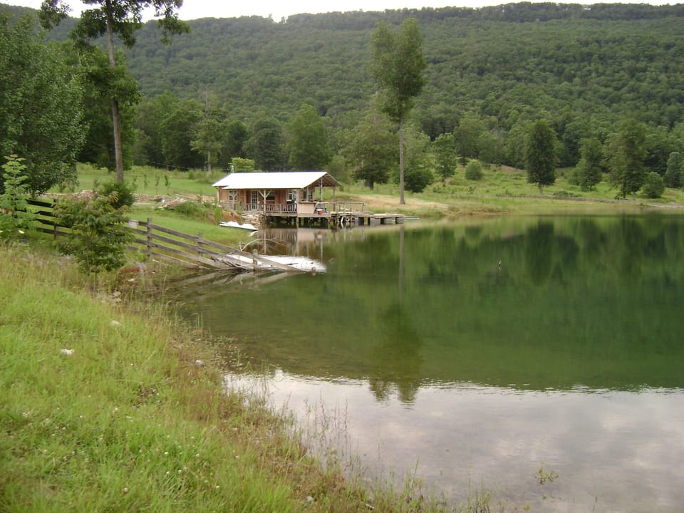 "THE PIER CABIN" SITS ON A LAKE, WHERE THE FISHING IS UNBELIEVABLE!