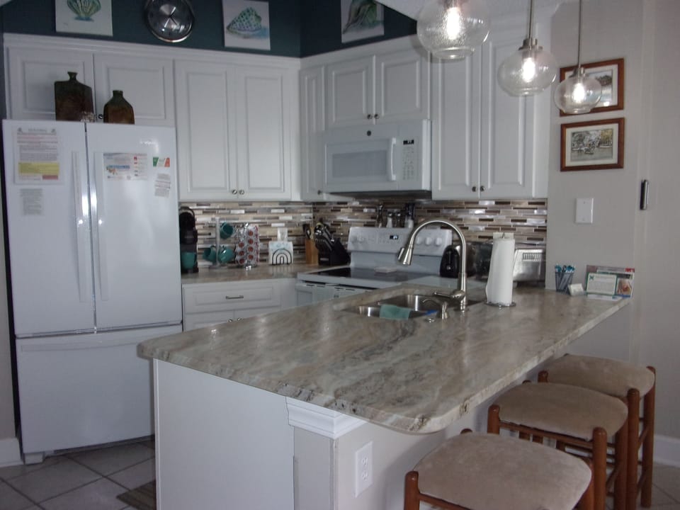 Bar stools at the counter for additional seating.
