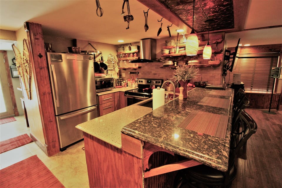 Heated floors, granite counters, stainless, filtered water, dish washer, all new