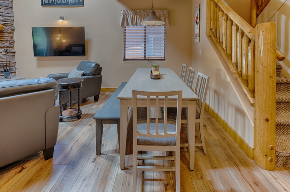 Dining table seats 8-10.  Great space for eating, playing games, and more!