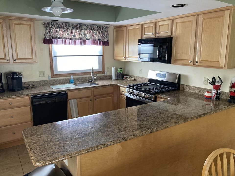 View of spacious kitchen area with new Appliances 