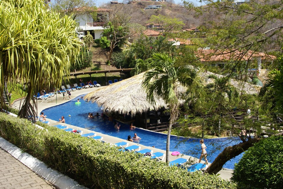 Large pool with swim-up bar