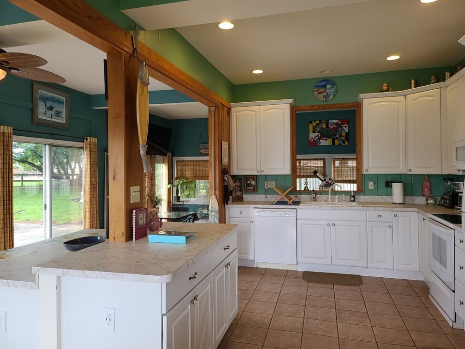 5 o'clock somewhere. 
A guest once said I want the home with the blue kitchen! 