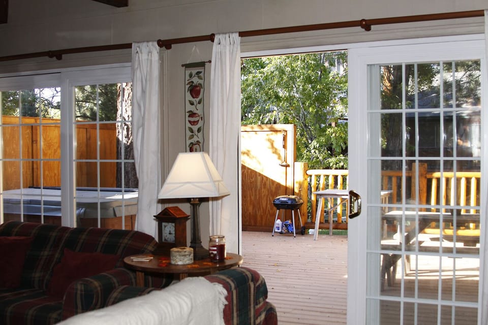 Back Deck view from inside living/play room*
see Spa on left, Picnic Table right