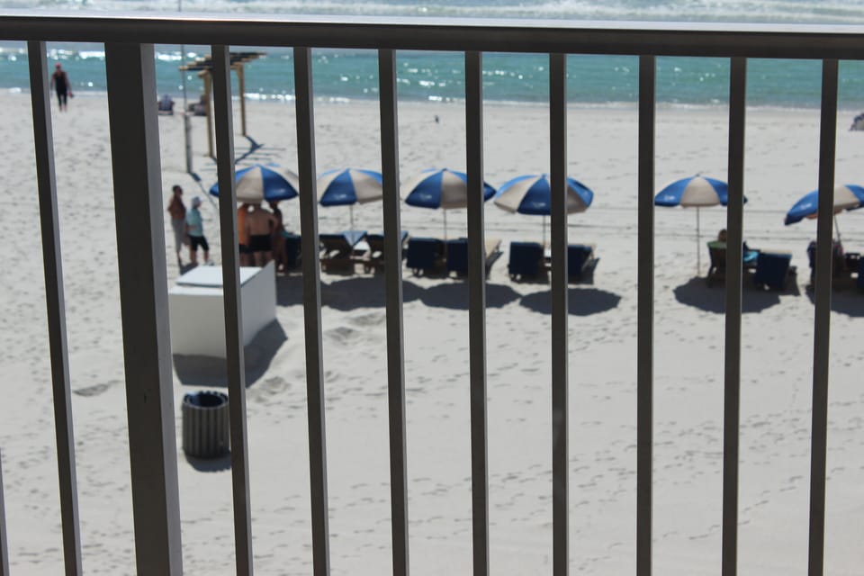 View From 2nd Floor Balcony to Beach. I provide 2 Beach Chairs with Rental