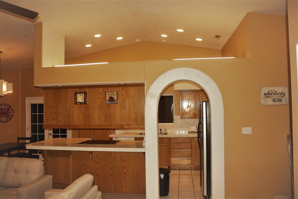 Open area kitchen with south facing view, great lighting and fully equipped.