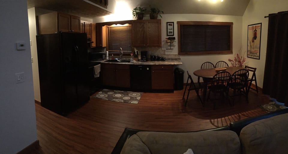 Looking into kitchen area from living area. Open plan. 