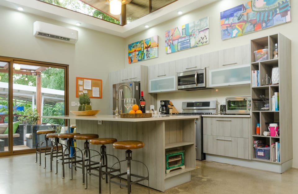 large indoor dining space and kitchen