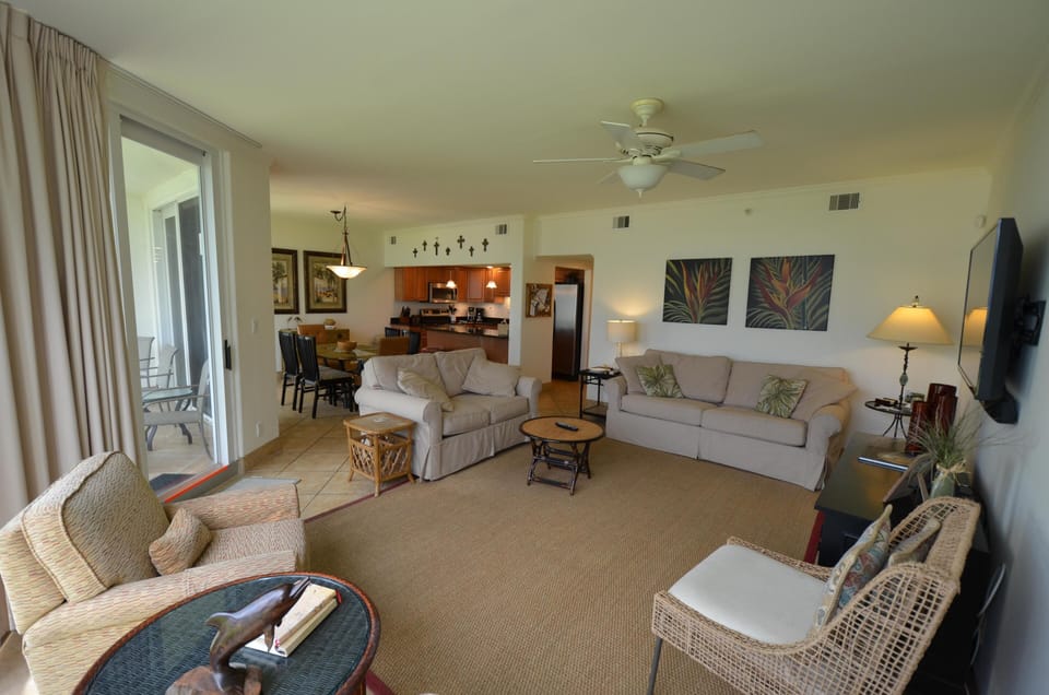 Very large living area with a 55" HDTV.  Beautiful views of the beach!