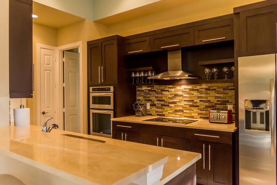 Glass Tile BackSplash; KitchenAid Stove; Convection Oven;Marble Tops. Soft Close