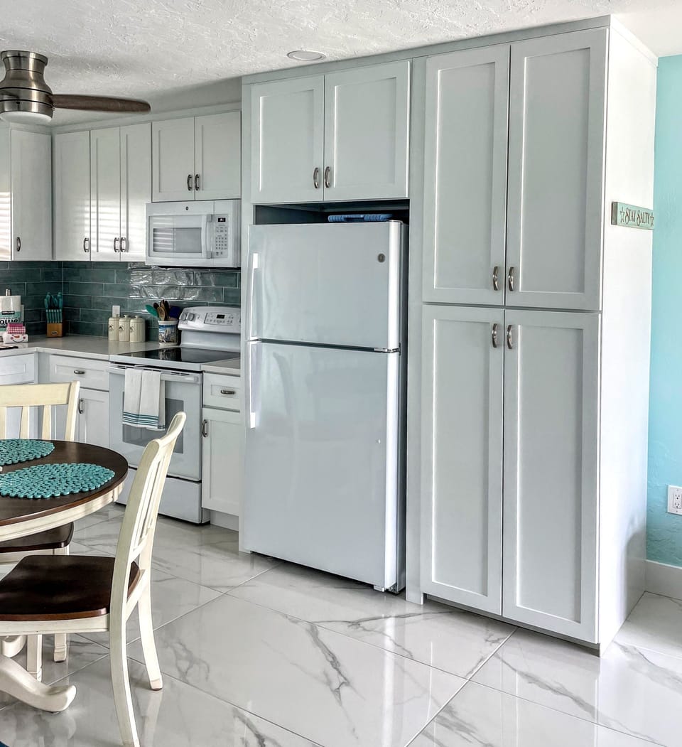 The eat-in kitchen has large pantry with lots of storage.