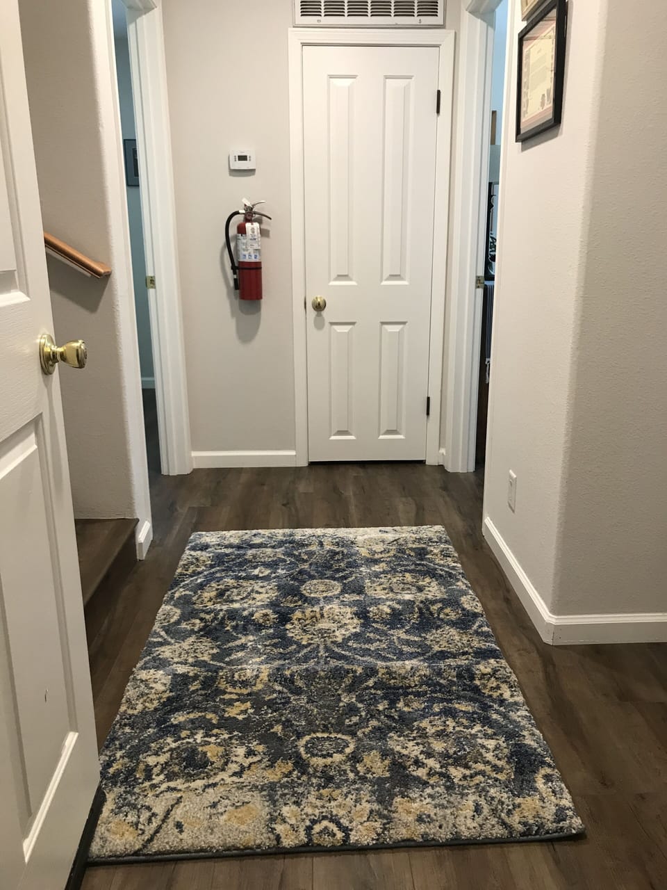 Downstairs hall-leads to 2 downstairs bedrooms, 2nd full bath, and garage