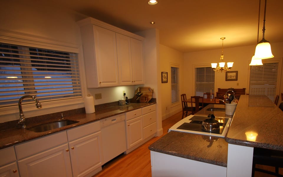 Large, Modern Kitchen With Two Sinks And Jenn Air Electric Range