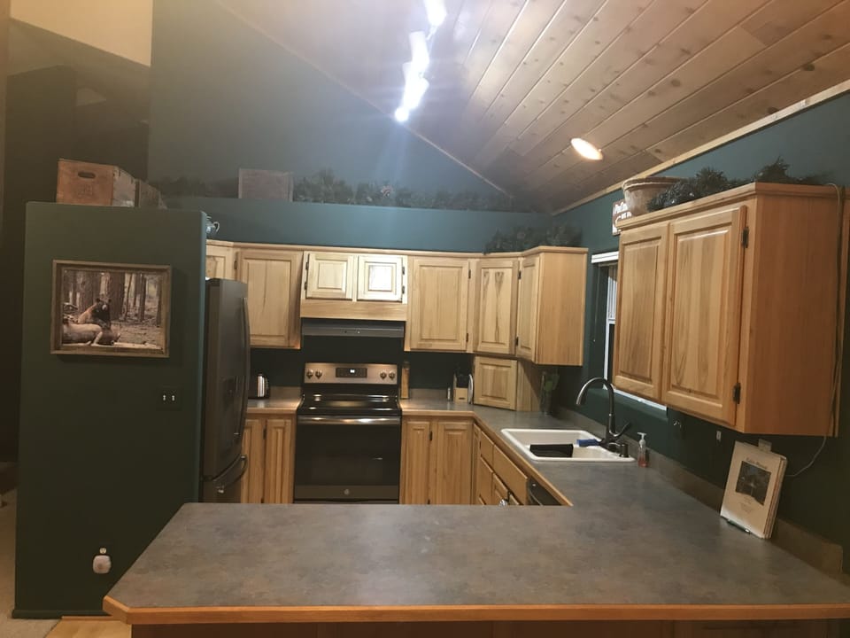 Fully stocked kitchen with microwave, toaster, blender, coffee & crock pots+more