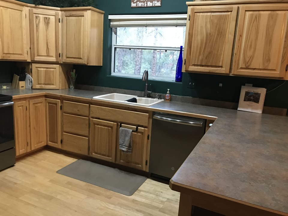 Fully stocked kitchen with new 3 rack dishwasher.