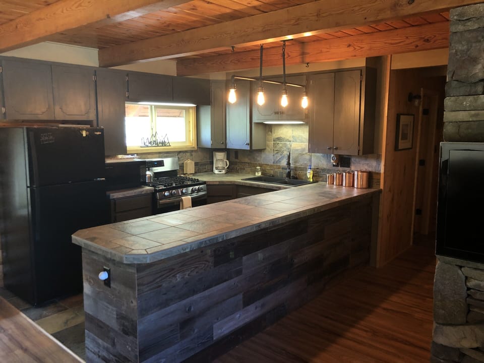Open concept to living area make for cozy family and friend get togethers!.