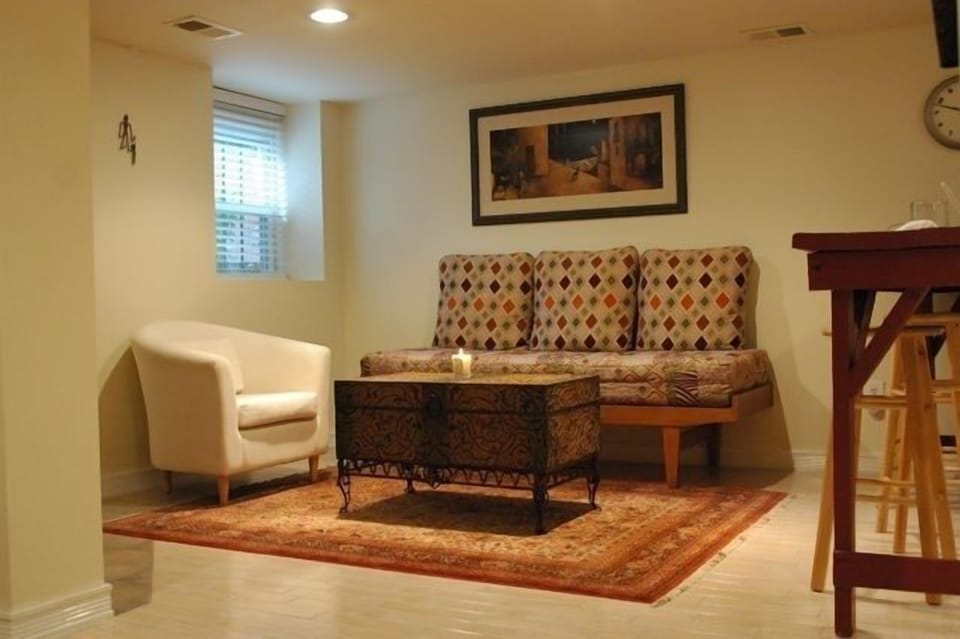 Living area w/ 2 daybeds. Serves as a twin or full.