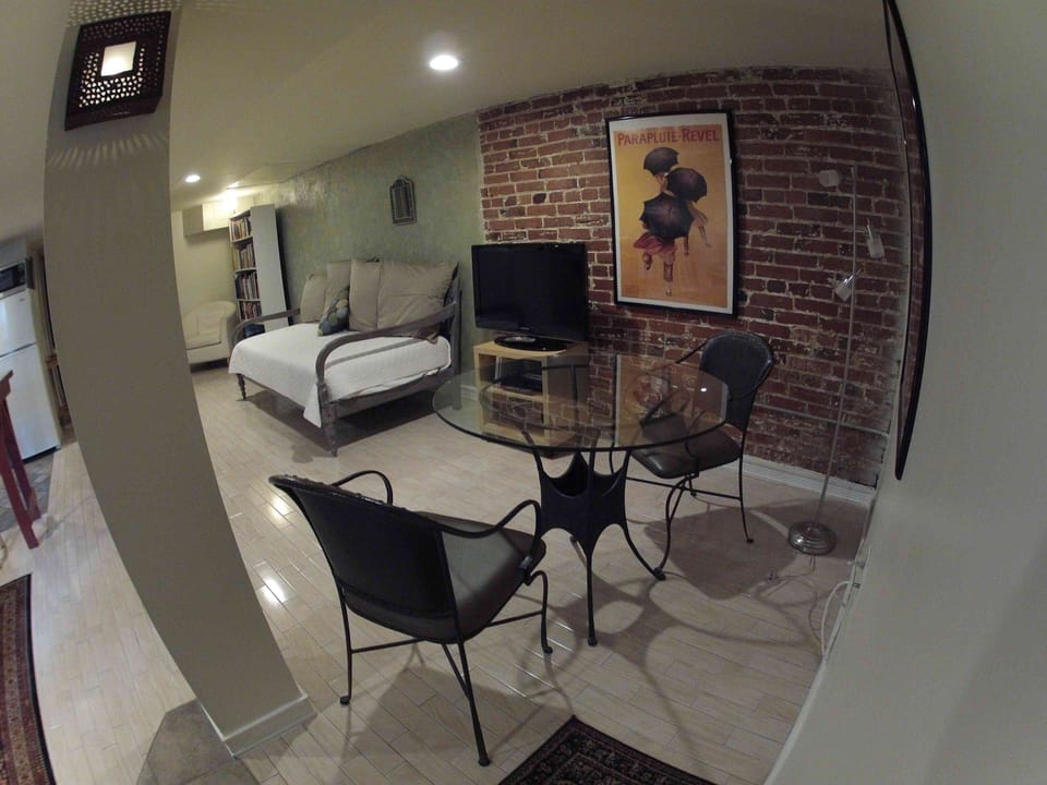 Dining area and view of full-size twin daybed.