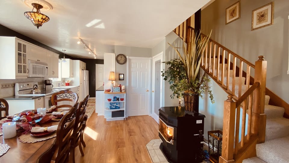 ENTER DINING ROOM.  STAIRS TO MASTER BEDROOM, QUEEN BDR AND LOFT COMMON AREA.