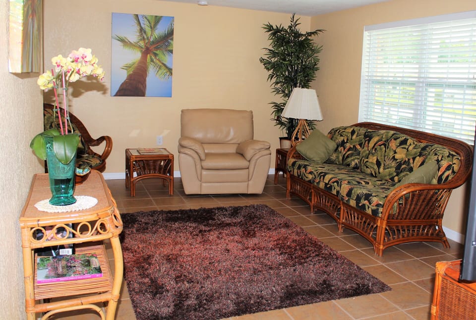 Living room with rattan and lazy boy