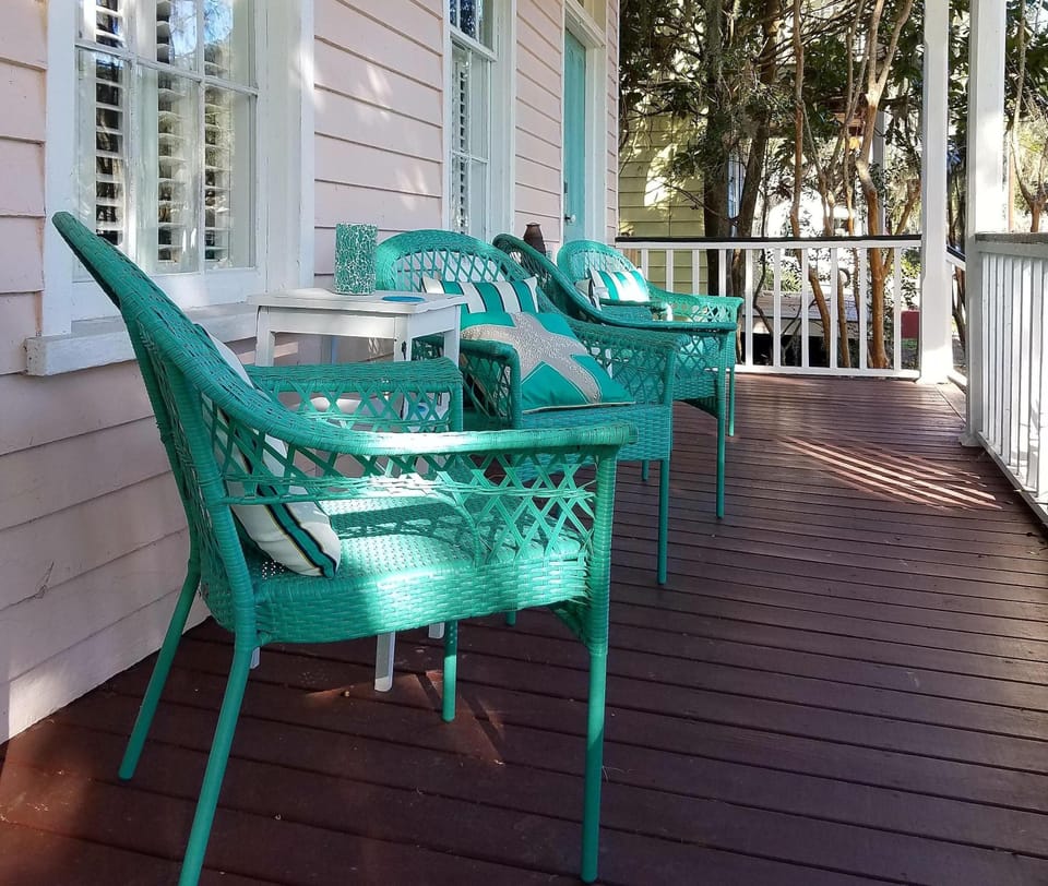 House has southern style upper and lower porches to enjoy during your stay
