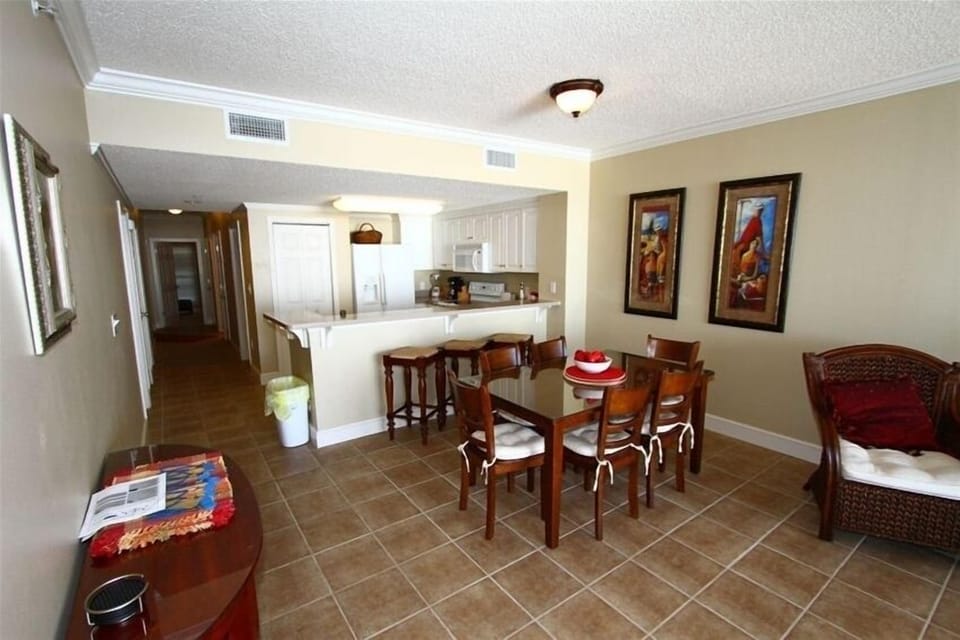 Large dining and living area with tile throughout! 