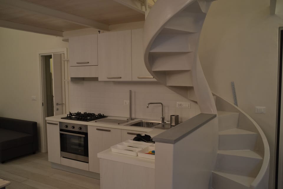 Kitchen with Oven, Hobs and Dishwasher