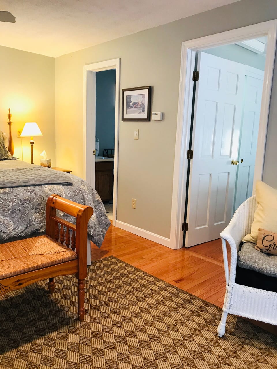 View from entrance. Bedroom with queen bed on right.