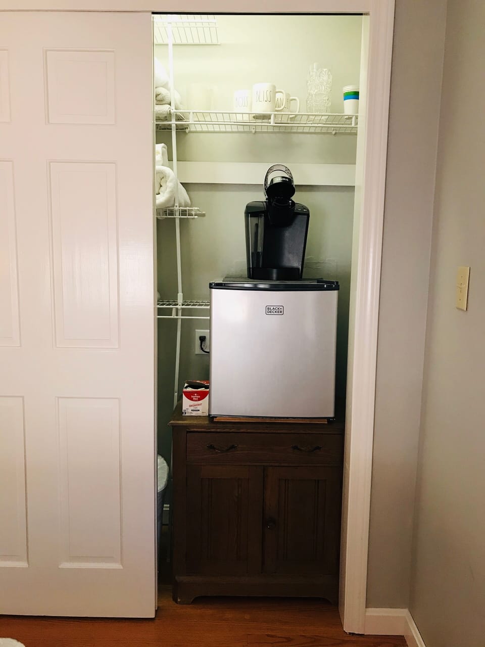 Mini fridge and Keurig. Coffee and tea, mugs, corkscrew, cream & sugar provided.