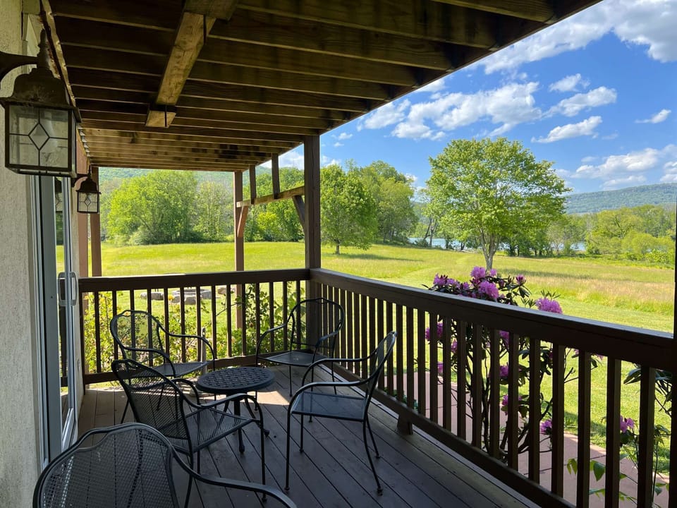 The back porch has beautiful views and a wonderful atmosphere.