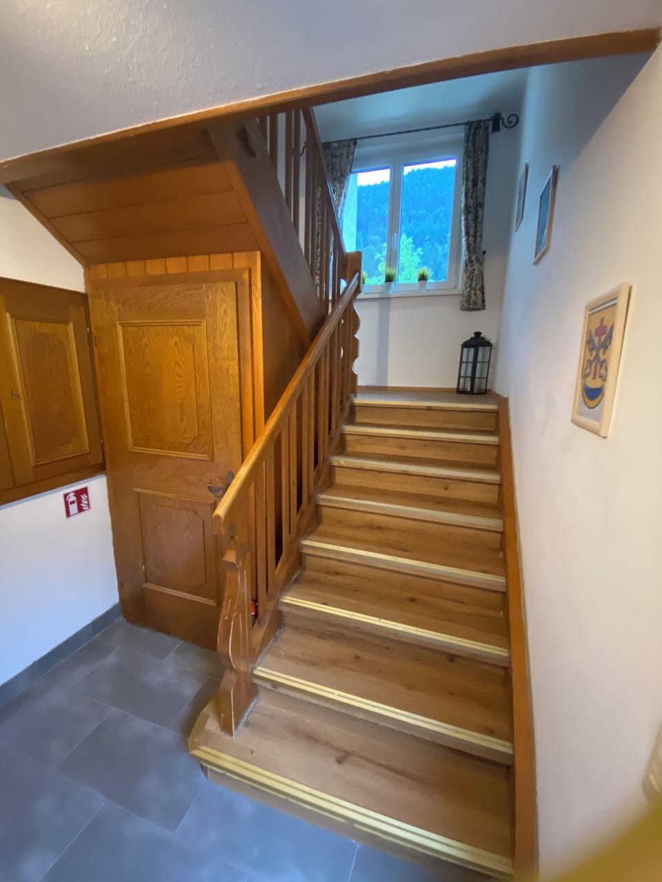 Stairs up to the living areas on the first floor.