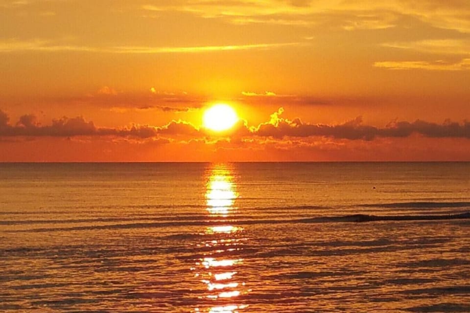 Sunset views from the private balcony, perfect for quiet evenings.