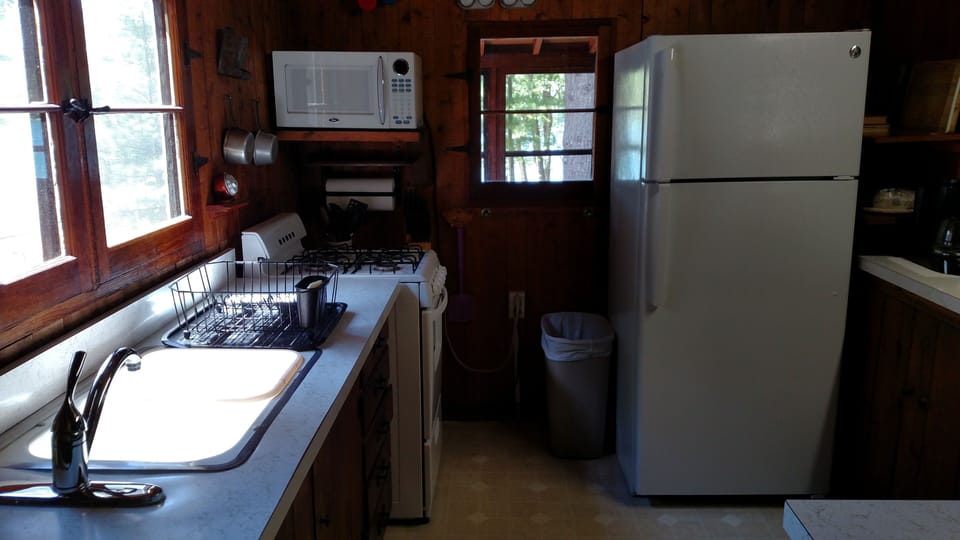 View of Kitchen. Has view of lake.