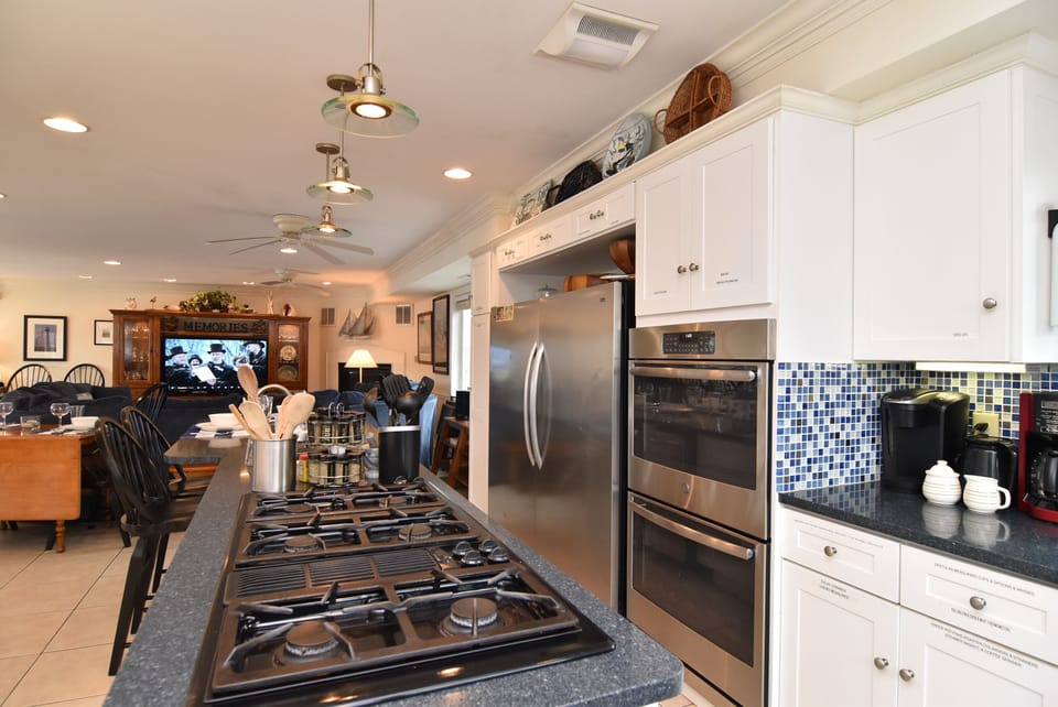 SIX BURNER JENN AIR GAS RANGE, NEW DOUBLE OVENS, AND SERVICE WARE FOR 32 GUESTS!