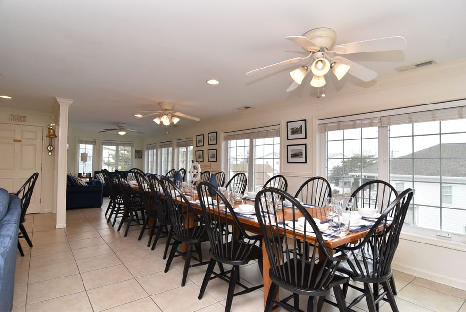 LARGEST DINING TABLE that seats 18-20 guests adjacent to the GOURMET KITCHEN!