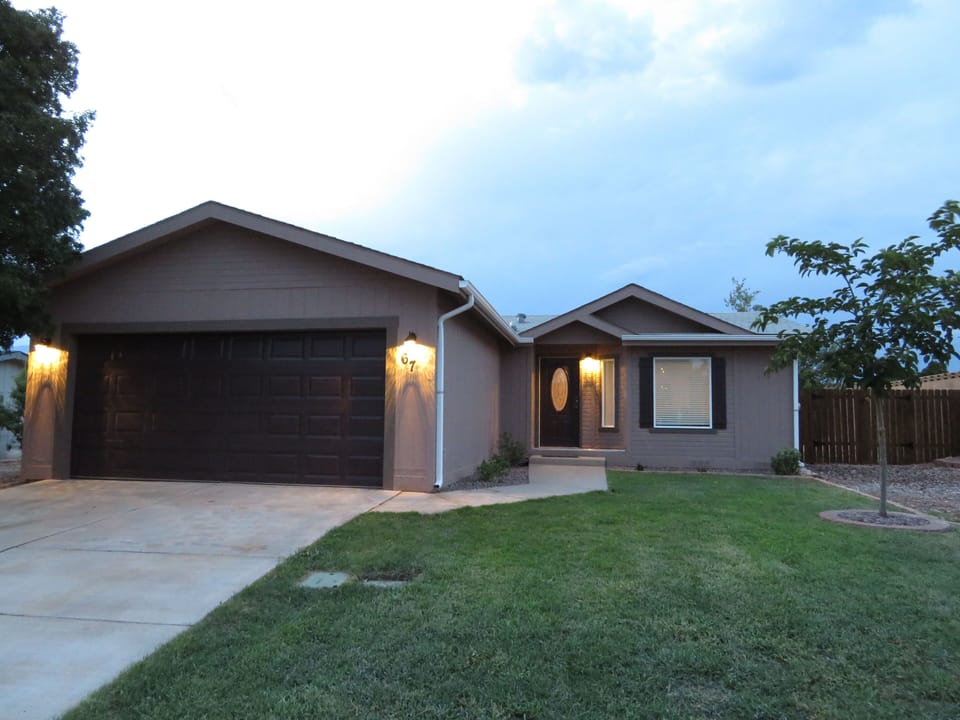 Lots of Parking!  Garage, driveway, RV/ATV trailer parking on side of the home! 