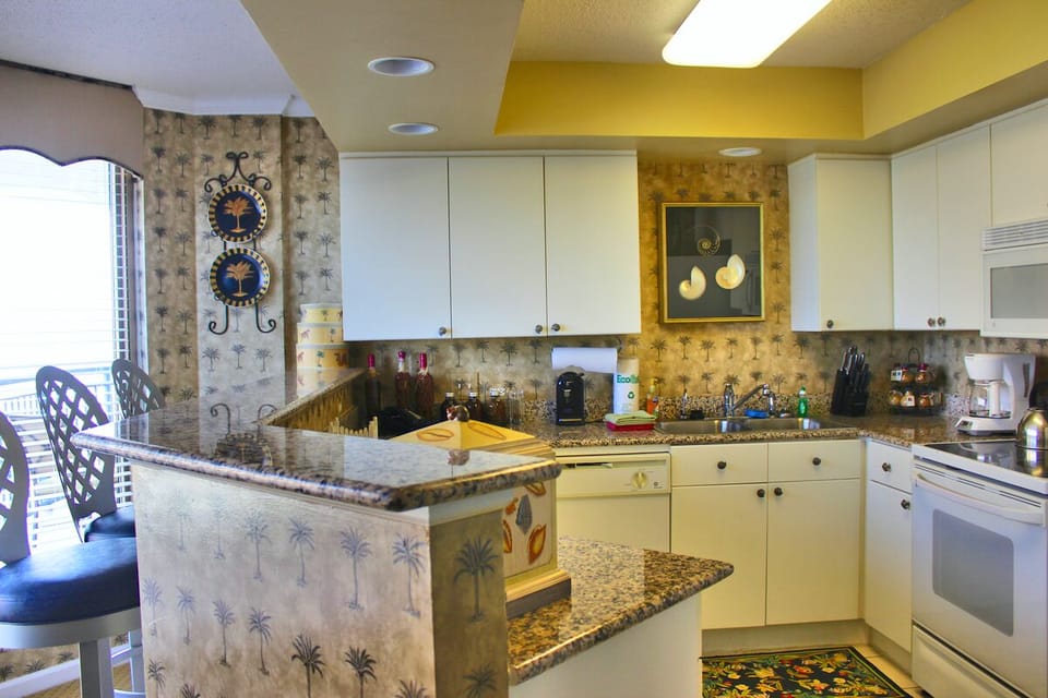 Fully stocked Kitchen and Bar area