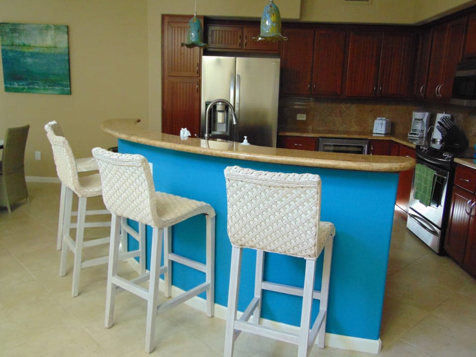 Kitchen island with 4 tall stools