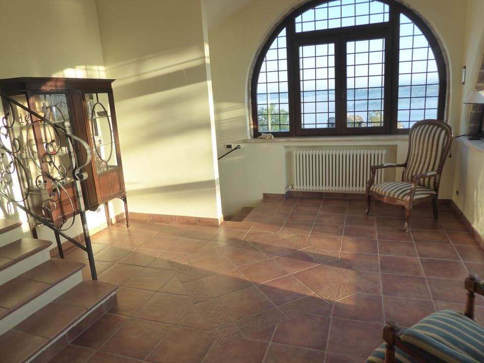 Spacious upper entrance from pool side of villa.