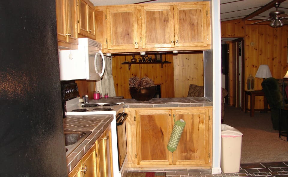 Kitchen with all new cabinets, counters and floors.