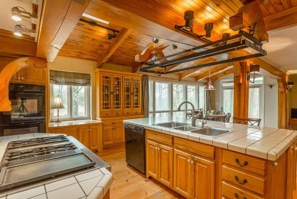 Beautiful open kitchen with everything you'd need to cook for large groups !
