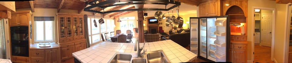 Large combination Kitchen, dining , living area . Another separate dining also 