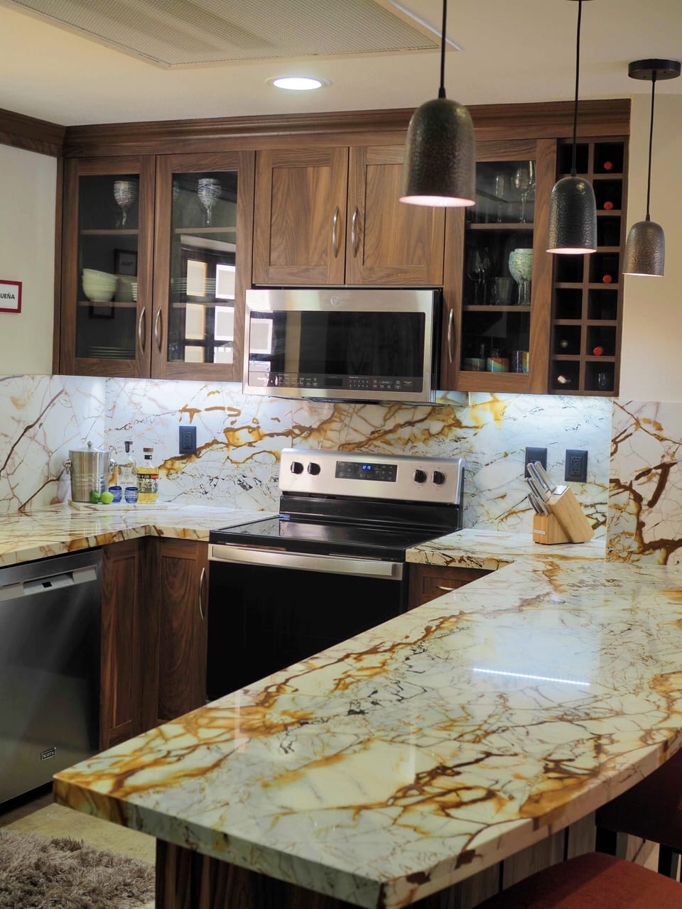 Stainless steel appliances and fully stocked kitchen