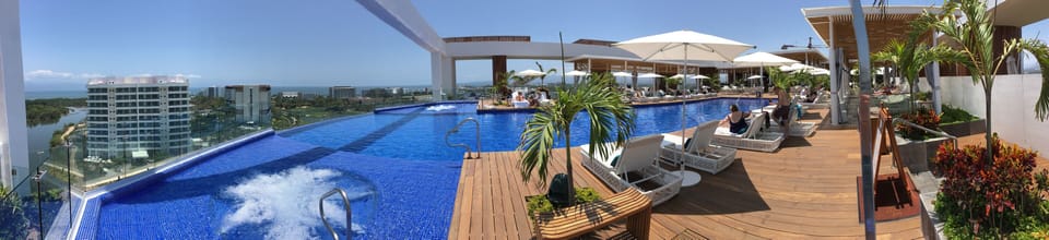 Panoramic view of the roof-top pool at Tower 5