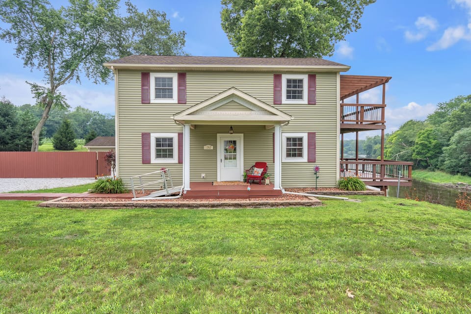 Front View of House with Accessible Ramp and Walkway. 